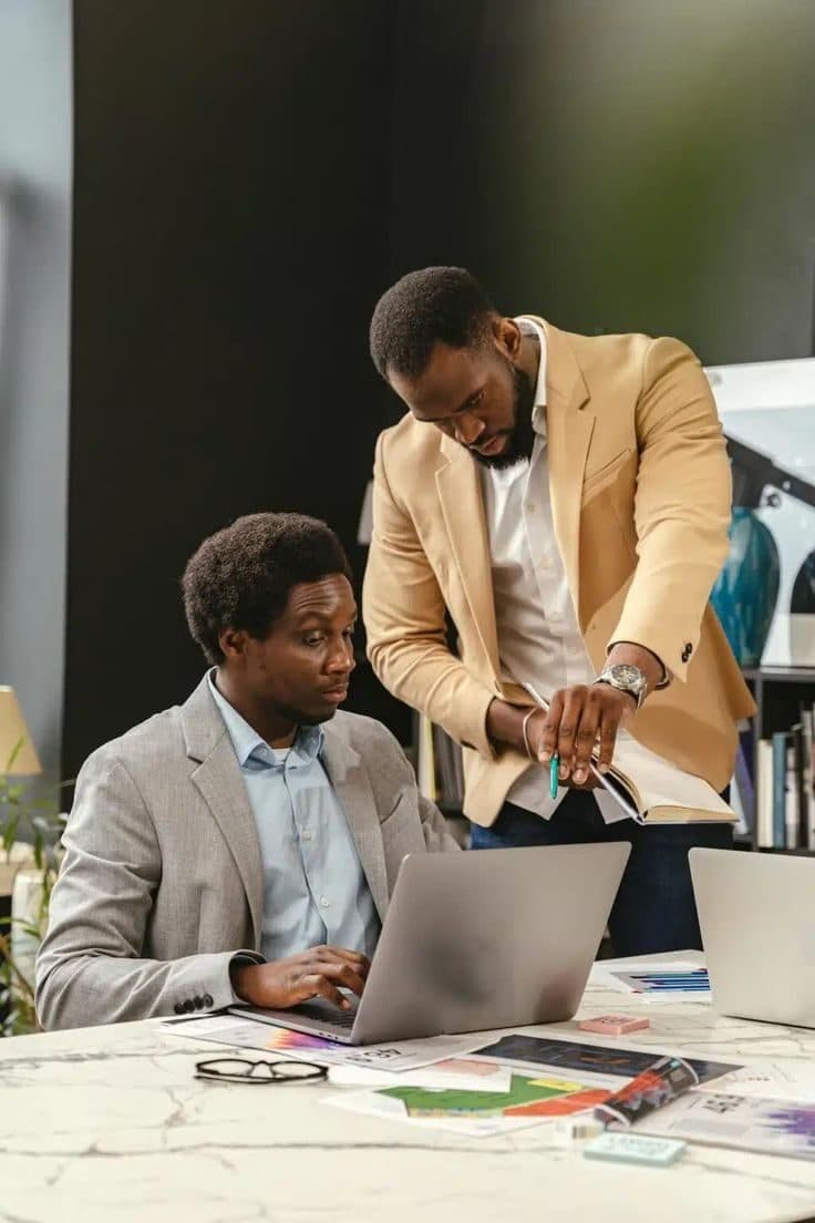 An ITF mentor guiding a founder through their materials